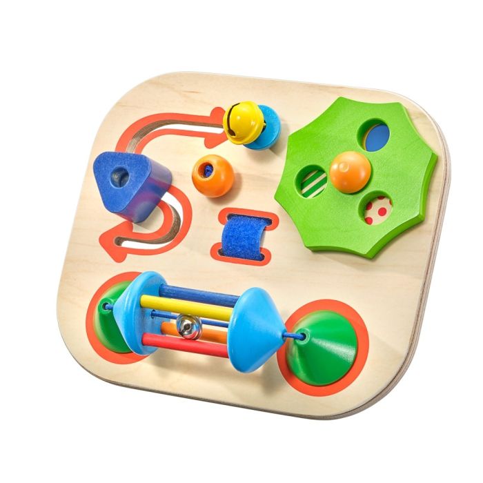 Spielmaterial vom Artikel 61067, Carusello, Motorikspielzeug mit Glöckchen aus Holz mit Klettverschluss, 19 cm